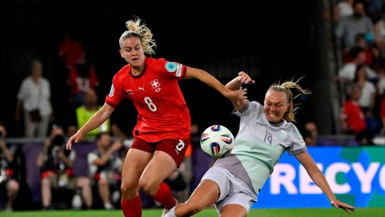 Switzerland’s defender #08 Nadine Riesen and Norway’s midfielder #18 Frida Maanum fight for the ball during the UEFA Women’s Euro 2025 Group A football match between Switzerland and Norway at the St Jakob-Park Stadium in Basel on July 2, 2025