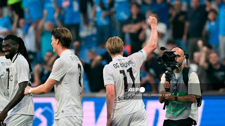 Napoli's Belgian midfielder #11 Kevin De Bruyne celebrates scoring his team's second goal during the Italian Serie A football match between Sassuolo and Napoli at the Mapei - Città del Tricolore stadium in Reggio Emilia, on August 23, 2025. - AFP