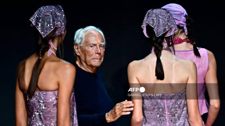 Italian designer Giorgio Armani walks the runway of the Emporio Armani fashion show during the Milan Fashion Week Womenswear Spring/Summer 2024 on September 21, 2023 in Milan. - AFP