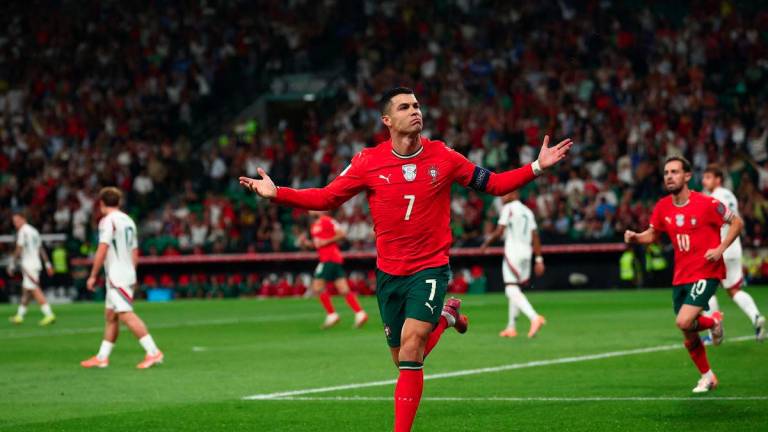 Football - FIFA World Cup - UEFA Qualifiers - Group F - Portugal v Hungary - Estadio Jose Alvalade, Lisbon, Portugal - October 14, 2025Portugal's Cristiano Ronaldo celebrates scoring their first goal - REUTERSPIX