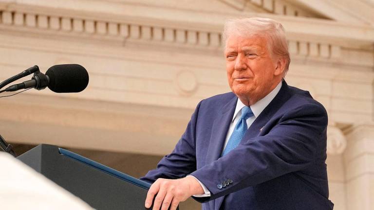 U.S. President Donald Trump delivers remarks at the annual National Memorial Day Observance in the Memorial Amphitheater at Arlington National Cemetery in Arlington, Virginia, U.S., May 26, 2025. REUTERSpix