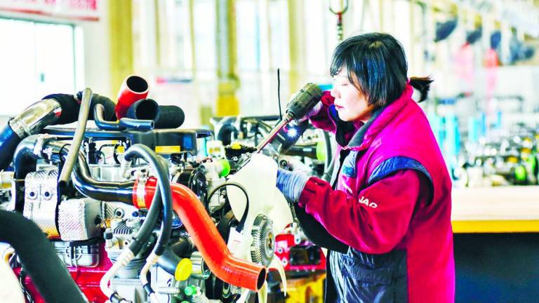 China’s large-scale production, even if in excess of its domestic demand, has led to lower unit costs globally. – AFPPIX