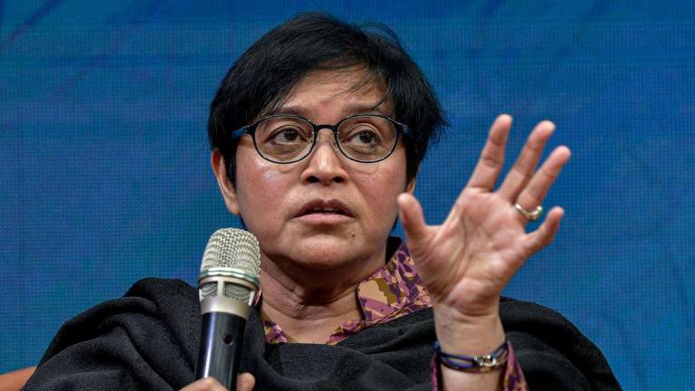 Menteri di Jabatan Perdana Menteri (Undang Undang dan Reformasi institusi) Datuk Seri Azalina Othman Said semasa sesi soal jawab pada Sesi Town Hall dan Majlis Peluncuran AI Legal Justice Roadmap 2025-2026 dan Peta Reformasi Institusi (PetaRI) di Fakulti Undang-Undang, Universiti Malaya hari ini. - fotoBERNAMA