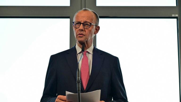 German Chancellor Friedrich Merz gives a statement before travelling to the G7 summit in Kananaskis, Canada, on June 15, 2025 at the Berlin-Brandenburg airport, near Berlin. (Photo by John MACDOUGALL / AFP)