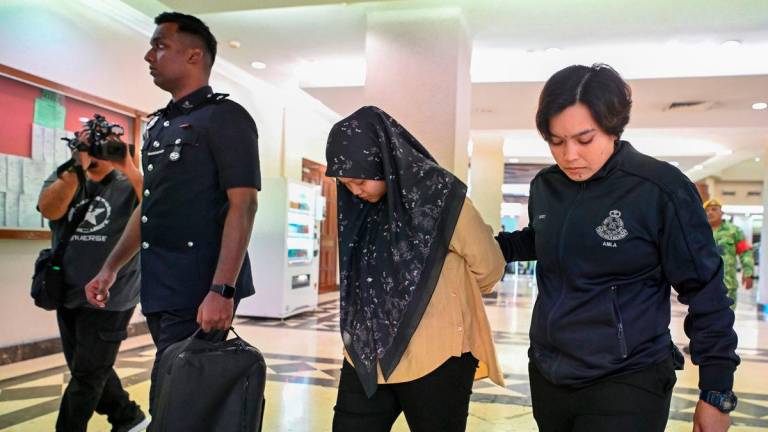 Nur Atiqah Asyirah Muhamad Fauzi, 28, bekas juruwang sebuah pasar raya mengaku tidak bersalah di Mahkamah Sesyen hari ini atas 14 pertuduhan melakukan pecah amanah dan pengubahan wang haram berhubung mesin terminal pin Touch 'n Go eWallet milik pasar raya itu berjumlah RM568,200. - BERNAMA