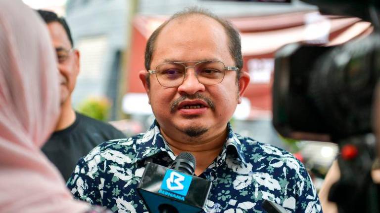 Setiausaha Politik Kanannya Datuk Seri Shamsul Iskandar Md Akin - fotoBERNAMA