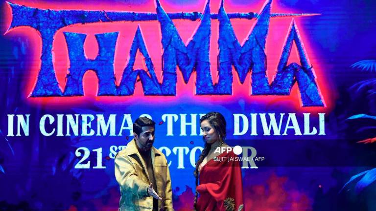 (FILES) Bollywood actors Ayushmann Khurrana (L) and Shraddha Kapoor attend the trailer launch of their Indian Hindi-language romantic comedy horror film 'Thamma' in Mumbai on September 26, 2025. - AFP