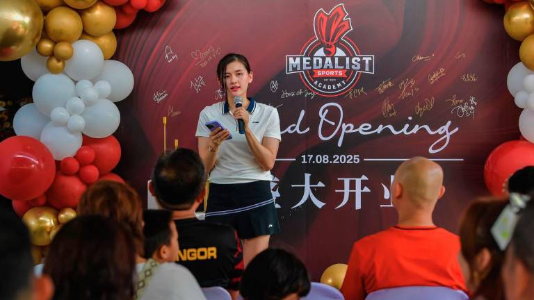 Former national women’s doubles player Woon Khe Wei delivering a speech at the Opening Ceremony of the Medalist International Sports Centre here today. - BERNAMA