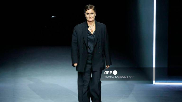 (FILES) Italian fashion designer Maria Grazia Chiuri acknowledges the audience following the presentation by Dior for the Womenswear Ready-to-wear Fall-Winter 2025/2026 collection as part of the Paris Fashion Week, in Paris on March 4, 2025. - AFP