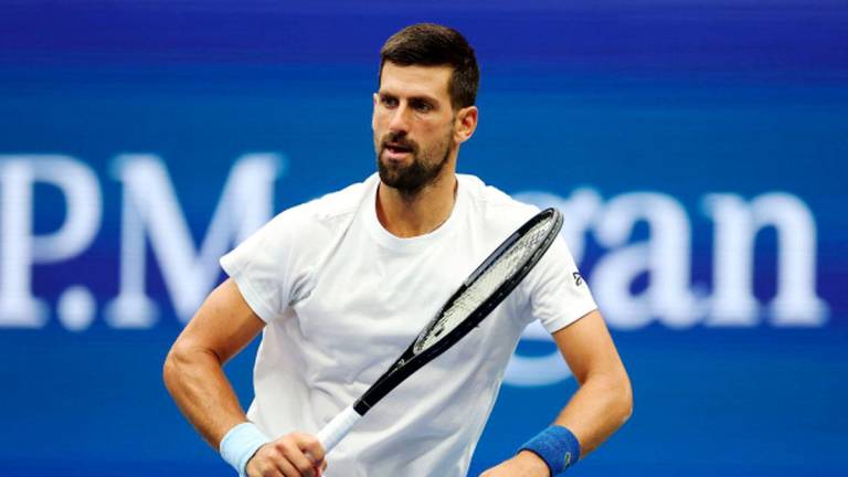 Novak Djokovic of Serbia returns a ball during a practice session ahead of the 2025 US Open at USTA Billie Jean King National Tennis Center on August 21, 2025 in the Queens borough of New York City. - Sarah Stier/Getty Images/AFPPIX