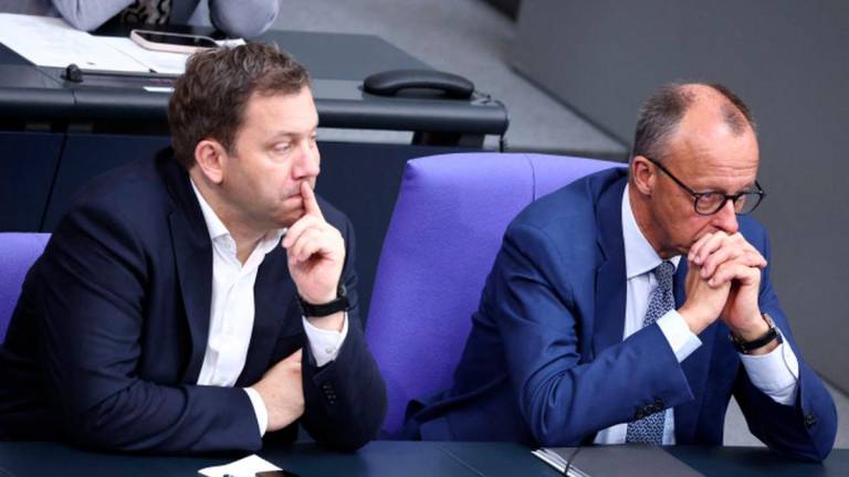 German Chancellor Friedrich Merz sits next to Finance Minister Lars Klingbeil in the plenary hall as the Bundestag, Germany’s lower house of parliament, is set to vote on three judicial appointments to the Federal Constitutional Court, requiring a two-thirds majority, in Berlin, Germany, July 11, 2025. One vote was ultimately postponed. - REUTERSPIX