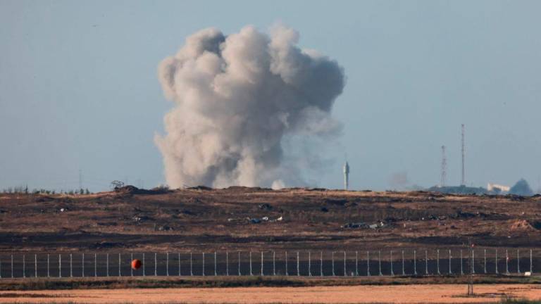 A picture taken near Israel’s border with Gaza shows smoke billowing in the besieged Palestinian territory on May 8, 2025, AFPpix