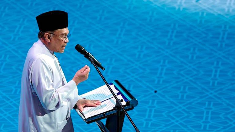 Perdana Menteri Datuk Seri Anwar Ibrahim menyampaikan ucapan pada Perasmian Tilawah dan Hafazan Al Quran Peringkat Antarabangsa (MTHQA) kali Ke-65 di Pusat Dagangan Dunia Kuala Lumpur (WTCKL) pada Ogos 2, 2025. - BERNAMA