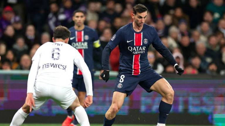 Paris Saint-Germain's Spanish midfielder #08 Fabian Ruiz controls the ball during the French L1 football match between Toulouse FC and Paris Saint-Germain (PSG) at the Stadium de Toulouse, in Toulouse, southwestern France, on February 15, 2025. - AFPPIX