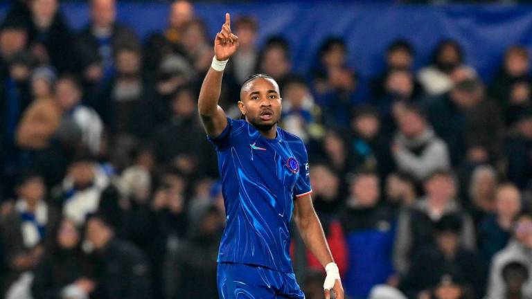 Chelsea's French striker #18 Christopher Nkunku celebrates scoring the team's seventh goal during the UEFA Europa Conference League, League Stage football match between Chelsea and FC Noah at Stamford Bridge in London on November 7, 2024. Chelsea's French striker Christopher Nkunku is leaving Chelsea to join AC Milan, both clubs confirmed on August 30, 2025. - AFP
