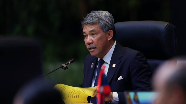 Malaysia’s Foreign Minister, Datuk Seri Mohamad Hasan, speaks at the ASEAN Post-Ministerial Conference with China, in conjunction with the 58th ASEAN Foreign Ministers’ Meeting (AMM) and related meetings at the Kuala Lumpur Convention Centre today. - BERNAMA