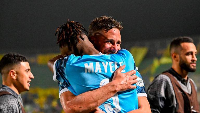 Pyramids’ Congolese forward #09 Fiston Mayele celebrates with Pyramids’ Egyptian forward #10 Ramadan Sobhi after scoring his team’s second goal during the second leg of the CAF Champions League final football match between Pyramids FC and Mamelodi Sundowns at 30 June Stadium in Cairo on June 1, 2025. (Photo by Khaled DESOUKI / AFP)
