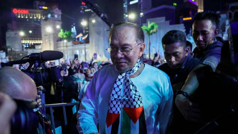 Malaysian Prime Minister Anwar Ibrahim attends a pro-Palestinian solidarity rally and aid mission send-off, amid the ongoing Israel-Hamas conflict in Gaza, at Kuala Lumpur, Malaysia, August 24, 2025. - REUTERS