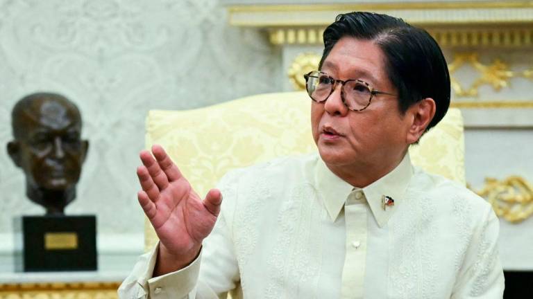 Filipino President Ferdinand Marcos Jr. speaks during a meeting with US President Donald Trump in the Oval Office at the White House in Washington, DC on July 22, 2025. (Photo by ANDREW CABALLERO-REYNOLDS / AFP)