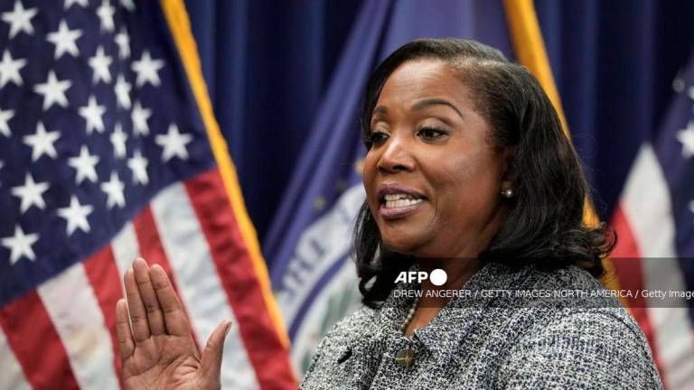 Lisa Cook takes the oath of office to serve as a member of the Board of Governors at the Federal Reserve System during a ceremony at the William McChesney Martin Jr. Building of the Federal Reserve May 23, 2022 in Washington, DC. - Getty Images via AFP