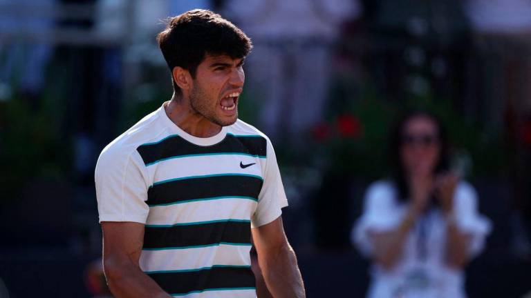 Spain’s Carlos Alcaraz celebrates winning against France’s Arthur Rinderknech during their men’s singles quarter final tennis match at the HSBC ATP tennis Championships at Queen’s Club in west London on June 20, 2025. AFPpix