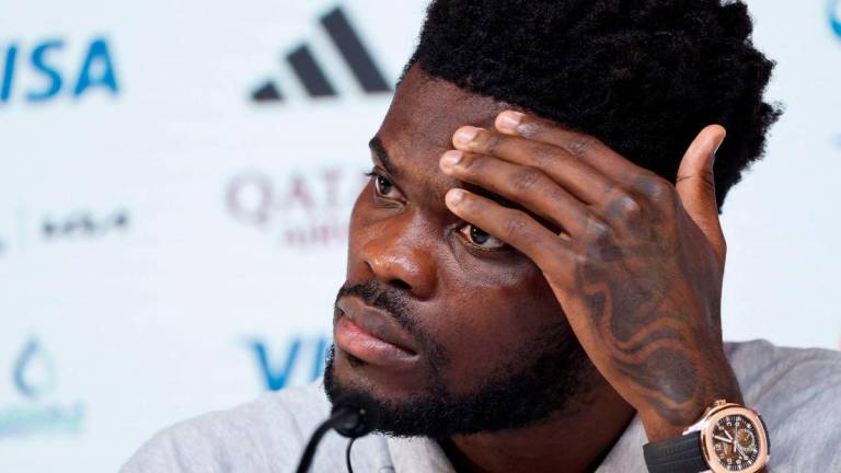 (FILES) Ghana’s midfielder #05 Thomas Partey gives a press conference at the Qatar National Convention Center (QNCC) in Doha on December 1, 2022, on the eve of the Qatar 2022 World Cup football match between Ghana and Uruguay - AFP