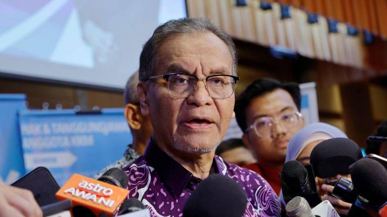 The Minister of Health, Datuk Seri Dr Dzulkefly Ahmad, speaking to the media after launching the Guidelines for Managing Workplace Bullying for Ministry of Health (MOH) Staff today. - BERNAMA
