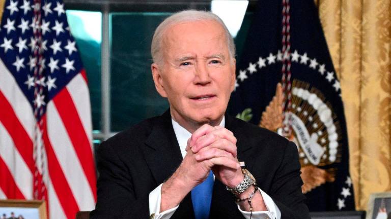 US President Joe Biden gestures as he delivers his farewell address to the nation from the Oval Office of the White House in Washington, DC, on January 15, 2025. - REUTERSPIX
