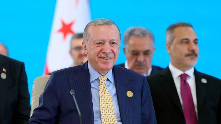 Turkey’s President Recep Tayyip Erdogan attending a session of the 12th Summit of the Organization of Turkic State (OTS) in Gabala, Azerbaijan. (Photo by Mustafa Kamaci / TURKISH PRESIDENCY PRESS OFFICE / AFP)