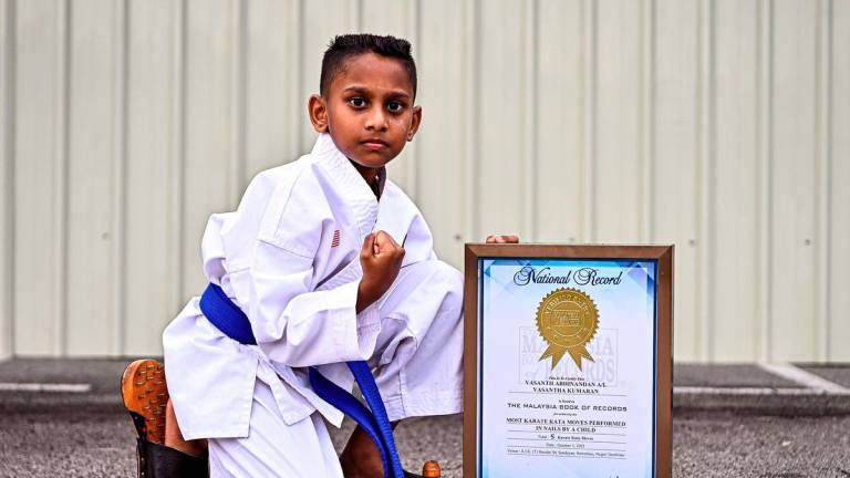 The extraordinary feat of an eight-year-old boy, V. Vasanth Abhinandan, performing Karate Kata movements while wearing “spiked shoes” for 10 minutes made history when his name was recognised in the Malaysia Book of Records (MBR). – BERNAMA
