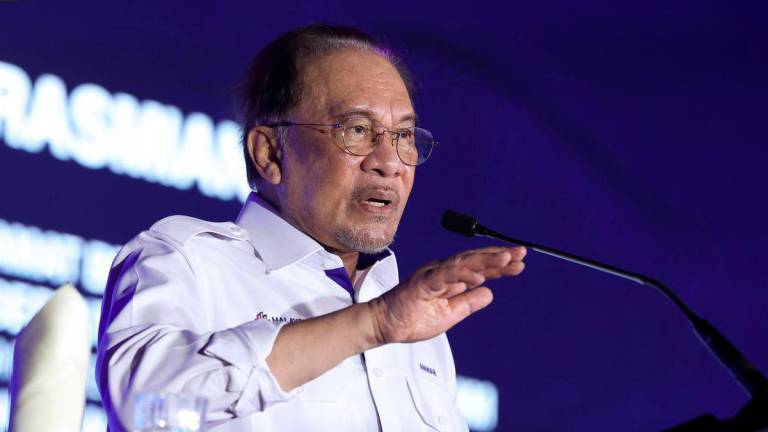 Perdana Menteri Datuk Seri Anwar Ibrahim berucap pada Majlis Perasmian Program MADANI Rakyat 2025 Negeri Sembilan di Dataran Nilai hari ini. - BERNAMA