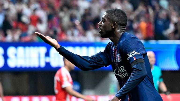 Paris Saint-Germain’s French forward #10 Ousmane Dembele celebrates scoring his team’s second goal during the FIFA Club World Cup 2025 quarterfinal football match between France’s Paris Saint-Germain and Germany’s Bayern Munich at the Mercedes-Benz Stadium in Atlanta on July 5, 2025. - AFP