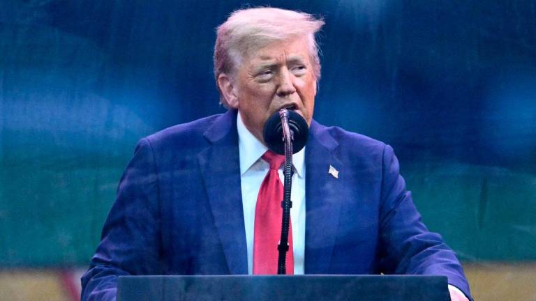 US President Donald Trump speaks during the Army 250th Anniversary Parade from the Ellipse in Washington, DC on June 14, 2025. AFPpix
