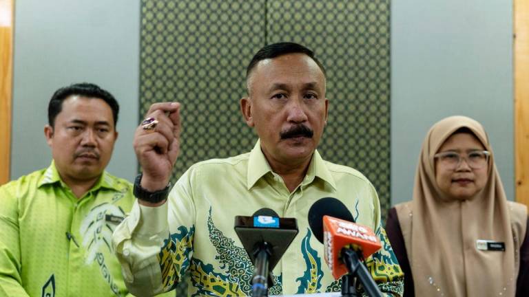 Ketua Pengarah Agensi Antidadah Kebangsaan (AADK) Datuk Ruslin Jusoh ketika bercakap pada sidang media selepas Mesyuarat Majlis Tindakan Membanteras Dadah (MTMD) di Kota Darul Naim hari ini- BERNAMA