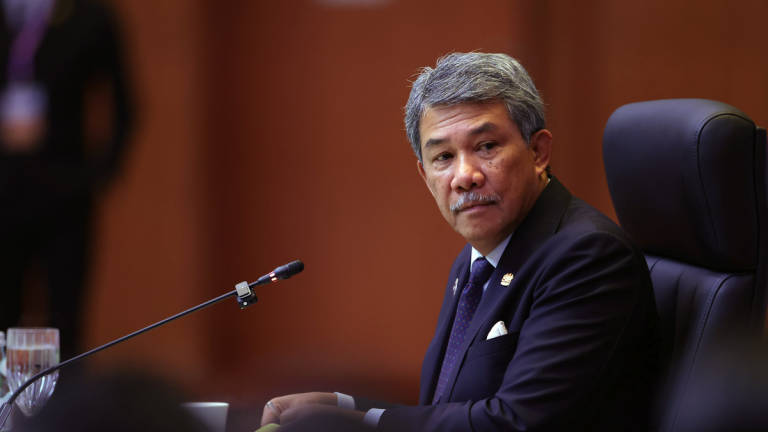 Malaysia’s Foreign Minister, Datuk Seri Mohamad Hasan, chairs the ASEAN Post-Ministerial Conference with China, in conjunction with the 58th ASEAN Foreign Ministers’ Meeting (AMM) and related meetings at the Kuala Lumpur Convention Centre today. - BERNAMA
