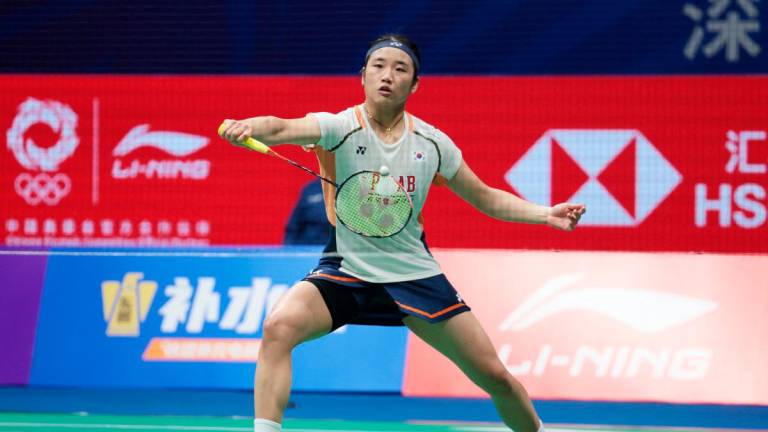 South Korea’s An Se-young hits a return to China’s Han Yue during their women's singles final at the China Masters badminton tournament in Shenzhen in China's southern Guangdong province on September 21, 2025. - AFPpix