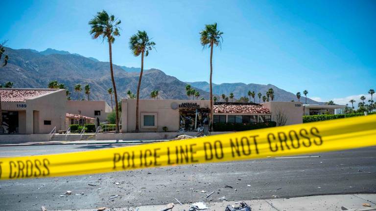 A police line is seen outside a damaged American Reproductive Centers fertility clinic after a bomb blast outside the building in Palm Springs, California, on May 17, 2025. AFPpix