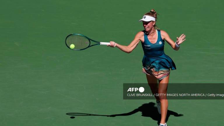 NEW YORK, NEW YORK - AUGUST 30: Magdalena Frech of Poland returns to Coco Gauff of the United States during their Women's Singles Third Round match on Day Seven of the 2025 US Open at USTA Billie Jean King National Tennis Center on August 30, 2025 in the Flushing neighborhood of the Queens borough of New York City. Clive Brunskill/Getty Images/AFPPIX