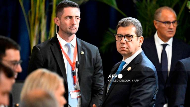 Egypt’s intelligence head Hassan Rashad (2nd R) is pictured on the sidelines of a summit meeting on Gaza in the Red Sea resort of Sharm el-Sheikh on October 13, 2025. Photo by KHALED DESOUKI / AFP