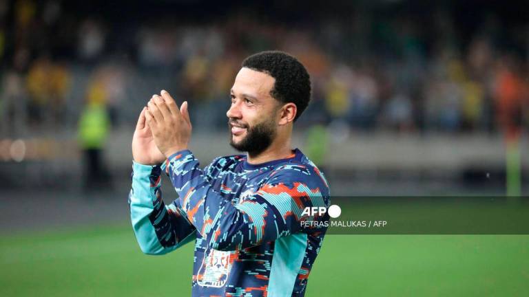 Netherlands' forward #10 Memphis Depay reacts after the 2026 World Cup qualifiers Europe zone group G football match between Lithuania and The Netherlands, on September 7, 2025 in Kaunas, Lithuania. - AFP
