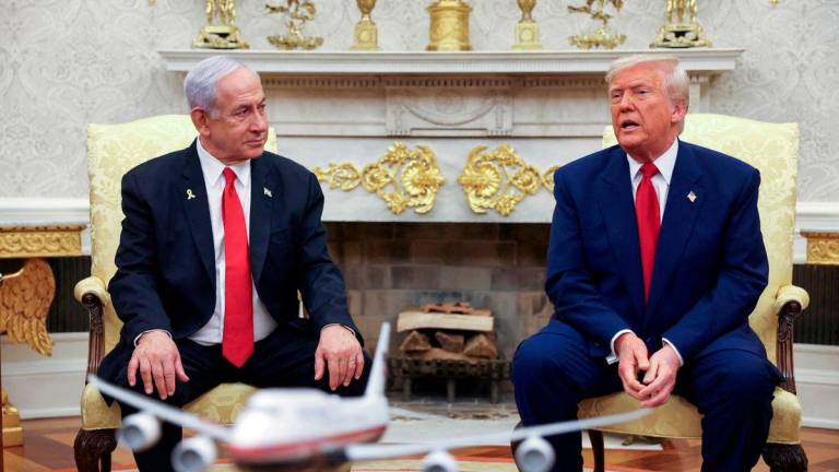 FILEpix: U.S. President Donald Trump talks to Israeli Prime Minister Benjamin Netanyahu during a meeting where Trump announced nuclear talks with Iran, Washington, U.S., April 7, 2025. REUTERSpix