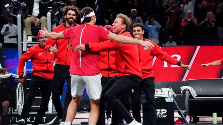 Team World player Alex Michelsen celebrates with Taylor Fritz after match point against Team Europe during the Laver Cup at Chase Center. - David Gonzales-Imagn Images
