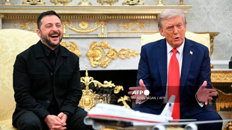 (FILES) Ukrainian President Volodymyr Zelensky and US President Donald Trump participate in a meeting in the Oval Office of the White House in Washington, DC, on August 18, 2025. - AFP