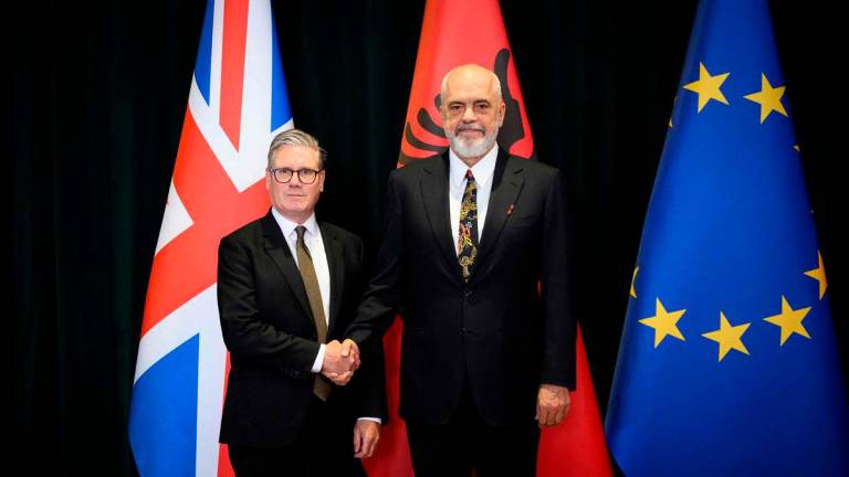 Britain’s Prime Minister Keir Starmer (L) poses for pictures with a Albania’s Prime Minister Edi Rama before their meeting at the Kryeministria Prime Minister’s office in Tirana on May 15, 2025. AFPpix