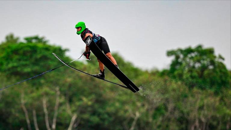 Aaliyah soaring into the sky in her jump event