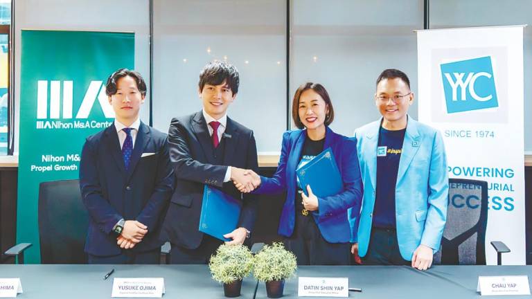 From left: Nihon M&amp;A Center managing director Yuki Fukushima, Ojima; Shin and YYC group executive chairman Yap Zhi Chau.