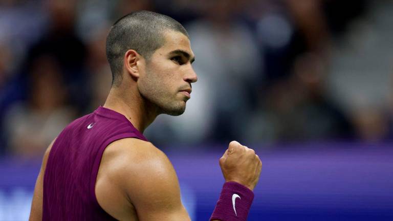 Carlos Alcaraz of Spain celebrates after defeating Mattia Bellucci of Italy during their Men's Singles Second Round match on Day Four of the 2025 US Open at USTA Billie Jean King National Tennis Center on August 27, 2025 in the Flushing neighborhood of the Queens borough of New York City. - Sarah Stier/Getty Images/AFPPIX