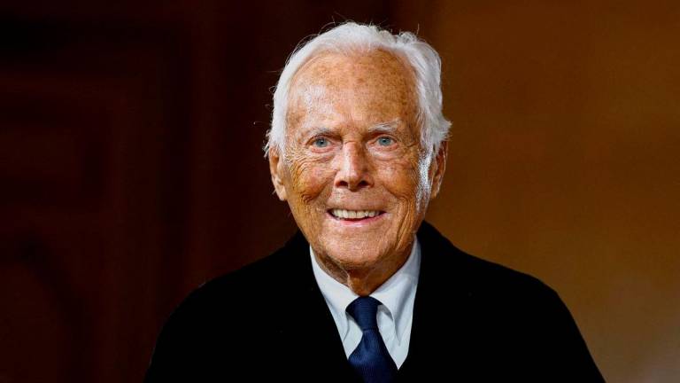 FILE PHOTO: Designer Giorgio Armani appears at the end of his Haute Couture Spring/Summer 2025 collection show for Giorgio Armani Prive in Paris, France, January 28, 2025. REUTERS