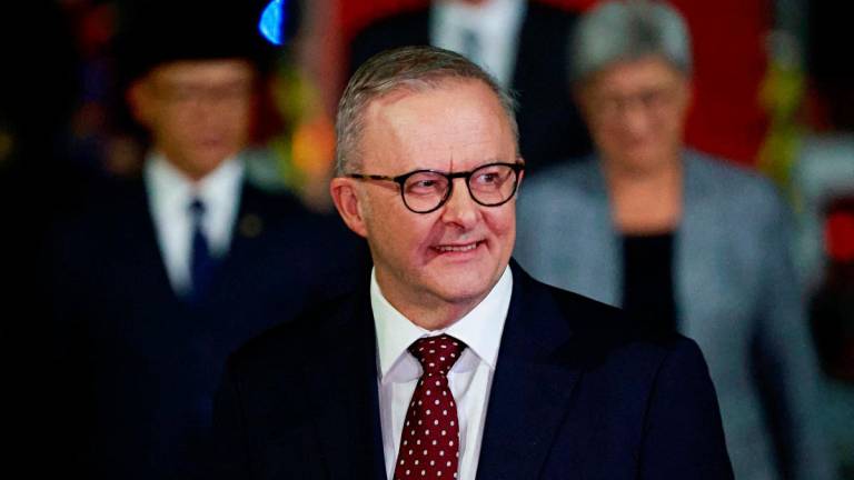 Australia’s Prime Minister Anthony Albanese reacts upon his arrival at military airbase Halim Perdanakusuma in Jakarta, Indonesia, May 14, 2025. REUTERSpix