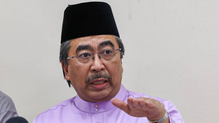 UMNO Vice-President and Minister of Plantation and Commodities, Datuk Seri Johari Abdul Ghani, speaks to reporters after attending the UMNO Pasir Gudang Division Delegates’ Meeting at Dewan Muafakat Taman Mawar, Pasir Gudang, today. – BERNAMA